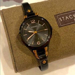 Rose gold and black leather watch